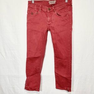 Rusty pink skinny jeans